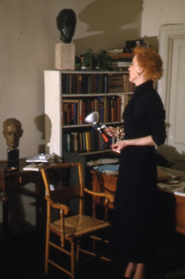 Sally Iselin photographing the 1956 Maynard Walker show